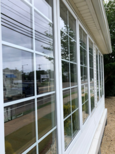 Start a window cleaning business like I did. This photo was taken on my very first job as a business owner!